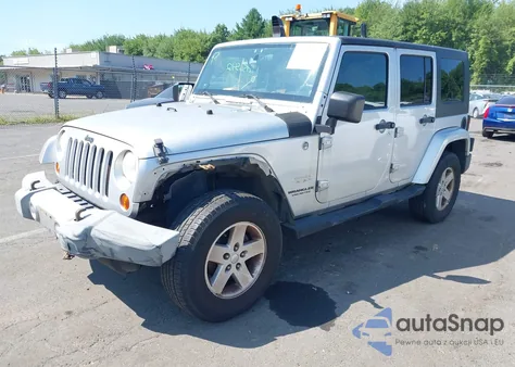2008 Jeep Wrangler Unlimited Sahara from USA, damaged, VIN 1J4GA59118L623149